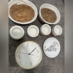 Gold and White Wall Clock small baskets small plate and tea light holders